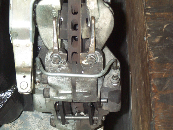 Note the spacers and the handbrake return springs cut in two and pinned in place.