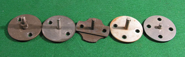 5 different variations of cam sprockets with earliest on left to latest on right